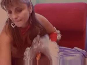 Discover the forbidden pleasures of bestiality with a sensual woman and her canine lover