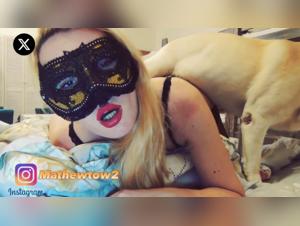 Bestiality sex video with a blonde and a dog
