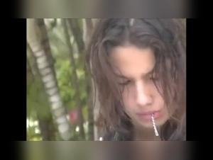 Sex scene with animals: a woman breastfeeds a dog