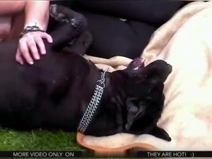 A woman and her dog in a beastly video