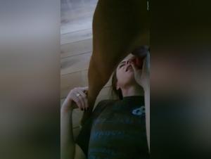 woman can't get loose from dog knot