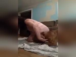 A debauchery: whores sucking their canine master