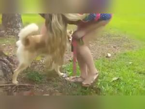 Discover the pleasures of bestiality with a mistress and her dog