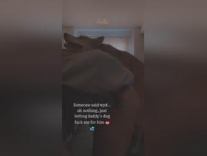 Watch this young woman fuck with a dog