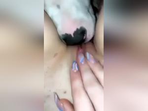 Discover the pleasures of bestiality with this submissive female dog and her canine master