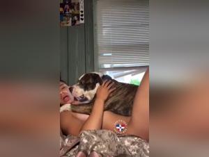 Hardcore zoophilia scene with a young girl and her dog