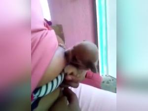 Extreme Bestiality Scene - Woman Breastfeeding a Cachorro